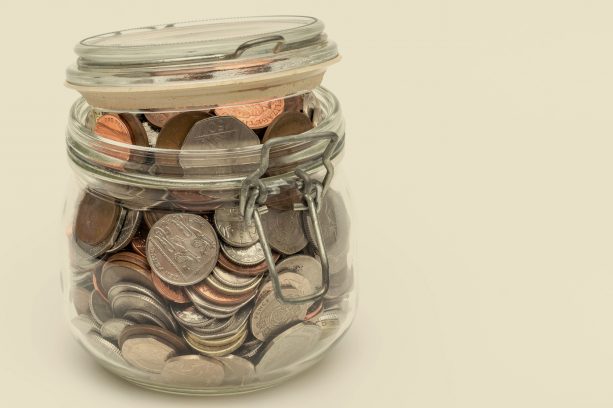 money jar with coins in