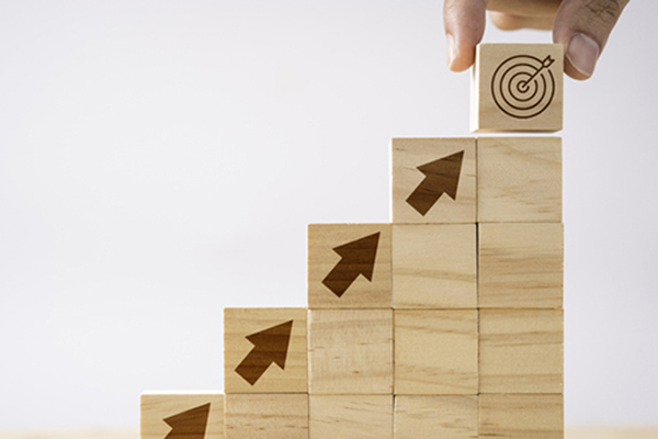 wood blocks with arrows to target board