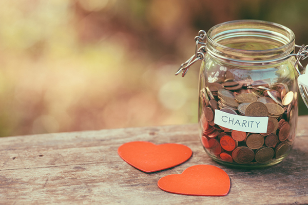 jar for charity and two heart shapes