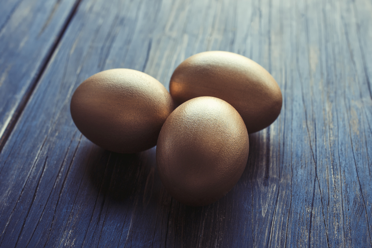 golden eggs on wood