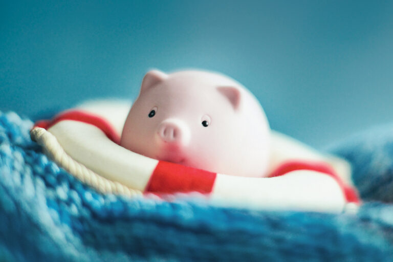 piggy bank in a life ring