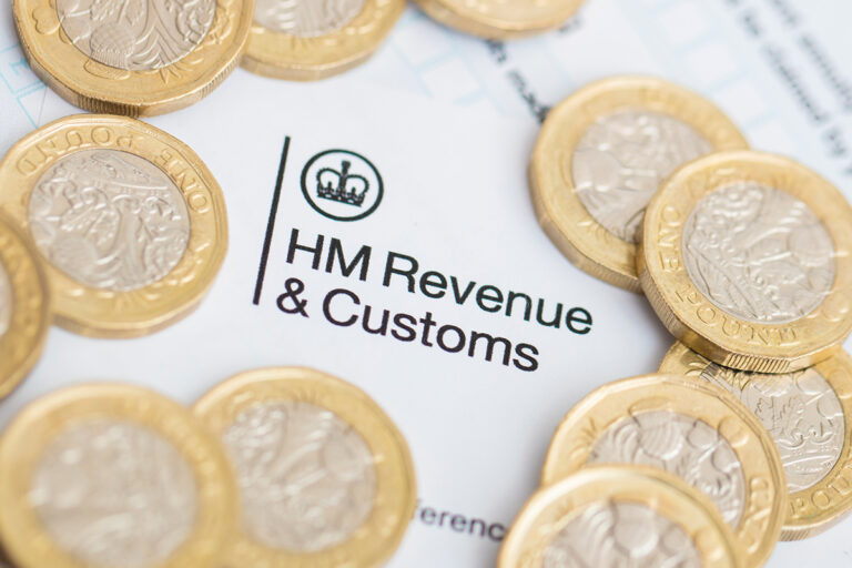 HM Revenues & customs logo surrounded by pounds coins